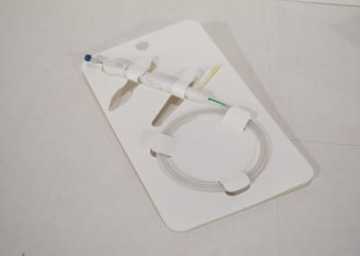 Custom Plain Rigid Plastic Medical Device Carrier with Special Die Cuts & Loading Mechanism